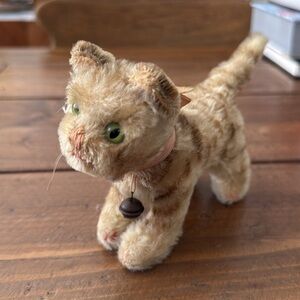 Vintage Steiff cat with original ribbon and bell